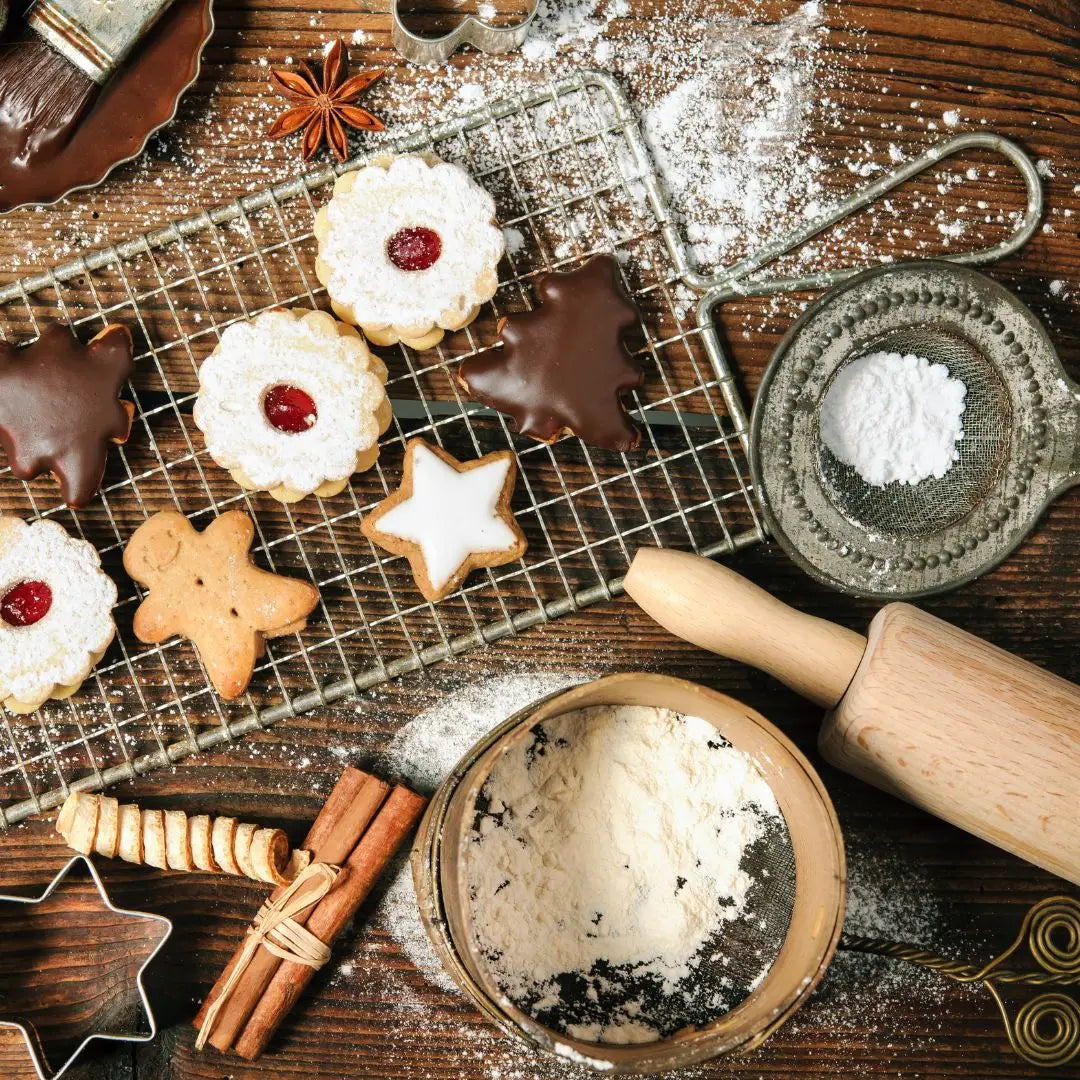 Assortment of Christmas cookies with protein powder and almond flour on a wooden surface