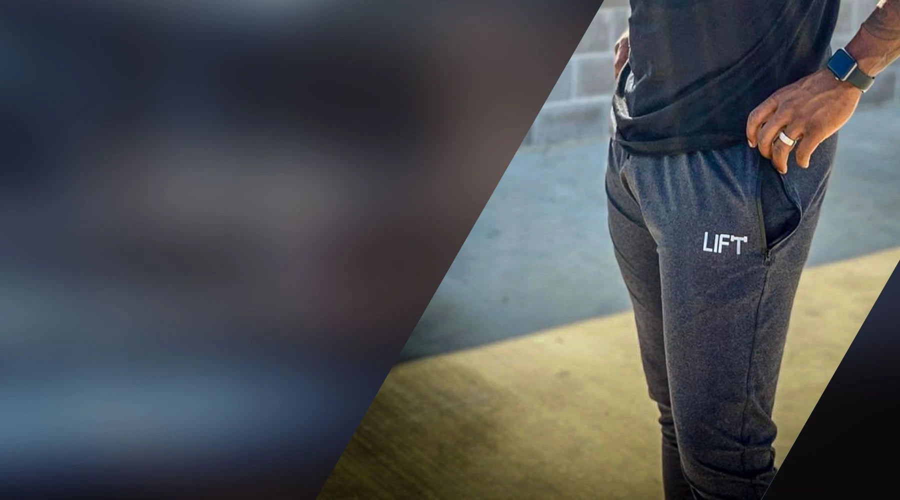 Dark blue school gym joggers featuring LIFT print and zipper pockets for functionality.