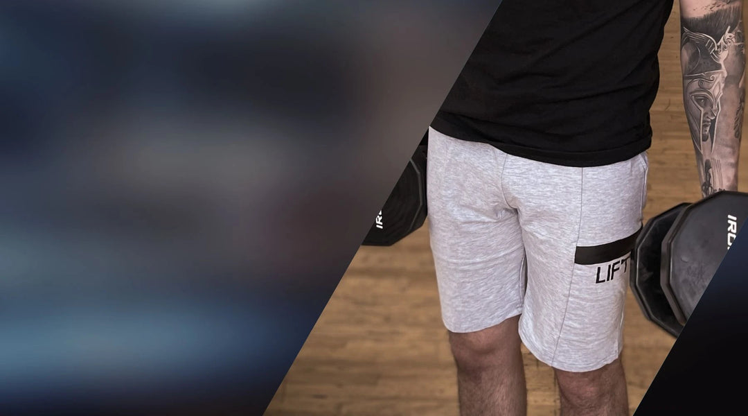 Gray athletic shorts with LIFT print, perfect for workouts and paired with contour leggings.